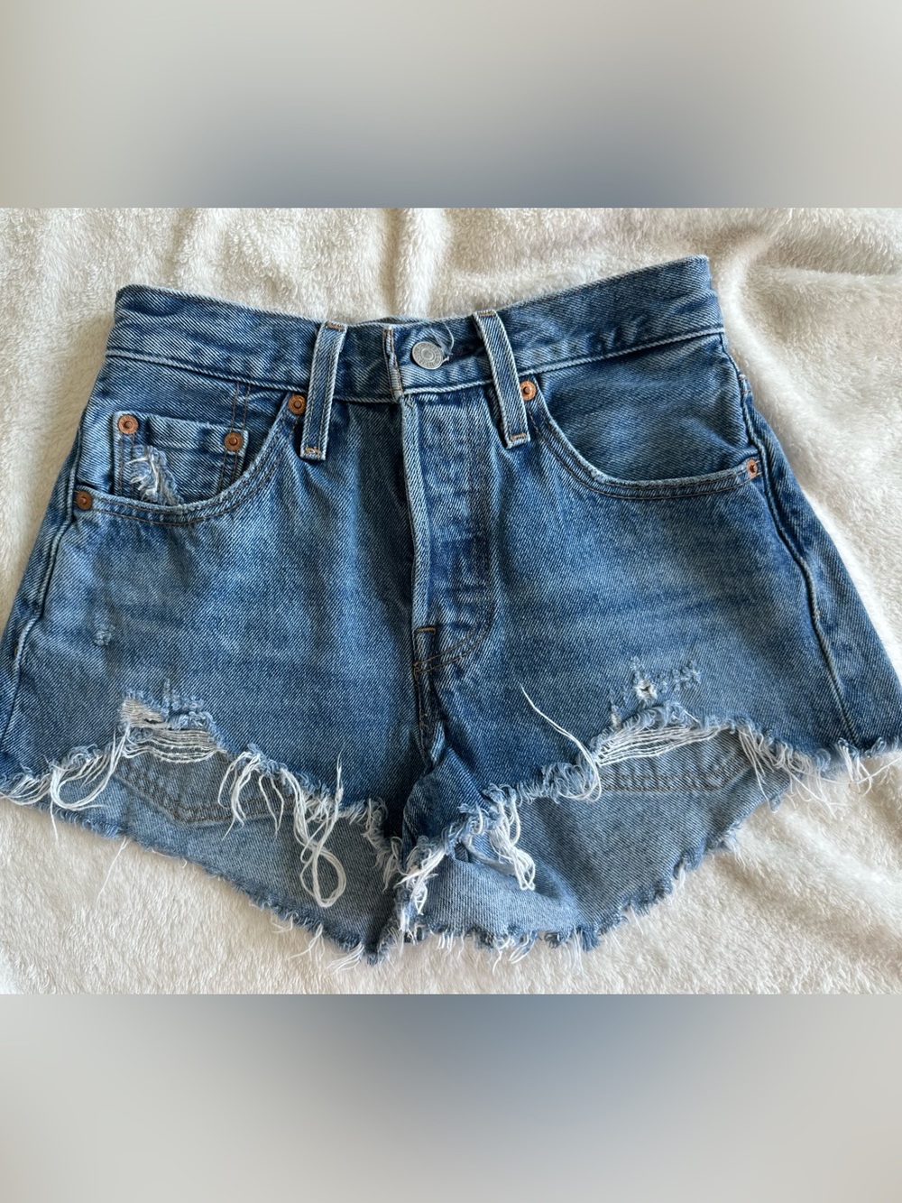Levi's Light Blue Distressed High-Rise Jean Shorts
